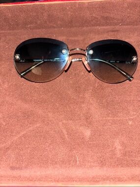 CHANEL Black Gradient Oval Sunglasses with Silver Accents